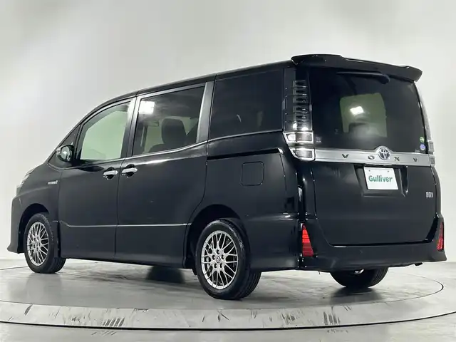 トヨタ ヴォクシー ハイブリッド ZS 煌Ⅱ 佐賀県 2019(令1)年 5.1万km ブラック 純正ディーラー10インチナビ/バックモニター/フルセグテレビ/CD/DVD/BT/SD/FM.AM/プリクラッシュセーフティ/レーンディパーチャーアラート/オートハイビーム/クルーズコントロール/前後ドライブレコーダー/社外シートカバー/ビルトインETC2.0/ステアリングスイッチ/保証書/取扱説明書