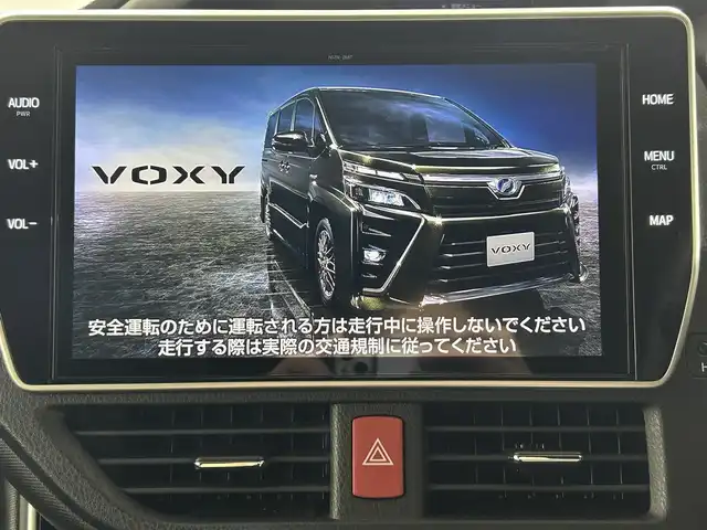 トヨタ ヴォクシー ハイブリッド ZS 煌Ⅱ 佐賀県 2019(令1)年 5.1万km ブラック 純正ディーラー10インチナビ/バックモニター/フルセグテレビ/CD/DVD/BT/SD/FM.AM/プリクラッシュセーフティ/レーンディパーチャーアラート/オートハイビーム/クルーズコントロール/前後ドライブレコーダー/社外シートカバー/ビルトインETC2.0/ステアリングスイッチ/保証書/取扱説明書