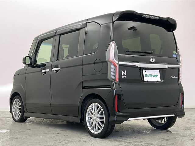 ホンダ Ｎ ＢＯＸ カスタム L ターボ 宮城県 2021(令3)年 6.9万km クリスタルブラックパール 禁煙車/ホンダセンシング/・衝突軽減ブレーキ/・路外逸脱抑制機能/・先行車発進お知らせ機能/・アダプティブクルーズコントロール/・車線維持支援システム/・標識認識機能/・オートハイビーム/・パーキングセンサー/Gathers純正7インチSD/・BT/iPod/SD/USB/AUX/AM/FM/バックカメラ/フルセグTV/両側パワースライドドア/前席シートヒーター/純正ドライブレコーダー（F/R）/純正ビルトインETC/革巻きステアリング/ステアリングスイッチ/パドルシフト/プッシュスタート/スマートキー/LEDヘッドライト/LEDフォグランプ/純正15インチアルミホイール/純正フロアマット/純正ドアバイザー/横滑り防止装置/アイドリングストップ