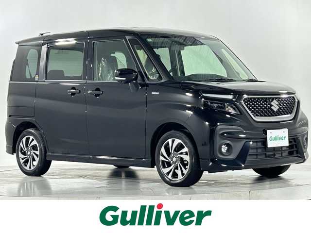 スズキ ソリオ バンディット HV MV 佐賀県 2024(令6)年 0.1万km未満 スーパーブラックパール 全方位カメラ(モニターなし)/両側パワースライドドア/前2席シートヒーター/ヘッドアップディスプレイ/ウィンカーミラー/革巻きステアリング/ステアリングスイッチ/オートエアコン/クルーズコントロール(追従あり)/レーンアシスト/LEDヘッドライト/盗難防止装置/横滑り防止装置/オートライト/スマートキー/スペアキー/プッシュスタート/USB入力端子/純正フロアマット/純正15インチアルミホイール/コーナーセンサー