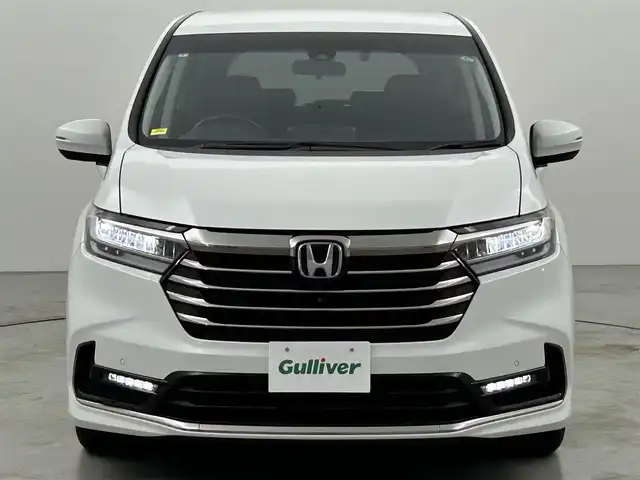 ホンダ オデッセイ ハイブリッド e:HEVアブソルート EX 福岡県 2021(令3)年 4.6万km プラチナホワイトパール 後席モニター　/純正ナビ　/全方位カメラ　/ＥＴＣ２．０　/ＡＣＣ　/コーナーセンサー　/衝突被害軽減ブレーキ　/レーンキープ　/ＢＳＭ　/パーキングアシスト　/両側電動スライドドア　/パワーバックドア　/Ｗエアコン　/ＬＥＤ