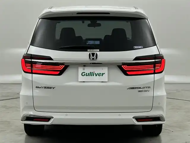 ホンダ オデッセイ ハイブリッド e:HEVアブソルート EX 福岡県 2021(令3)年 4.6万km プラチナホワイトパール 後席モニター　/純正ナビ　/全方位カメラ　/ＥＴＣ２．０　/ＡＣＣ　/コーナーセンサー　/衝突被害軽減ブレーキ　/レーンキープ　/ＢＳＭ　/パーキングアシスト　/両側電動スライドドア　/パワーバックドア　/Ｗエアコン　/ＬＥＤ
