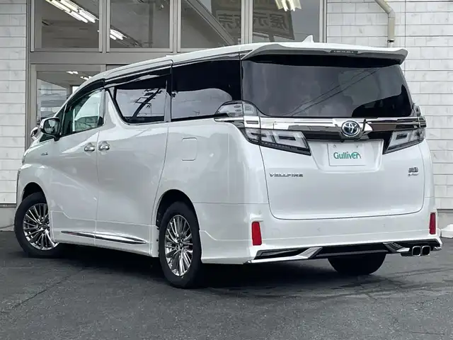 トヨタ ヴェルファイア ハイブリット ZR Gエディション 岩手県 2018(平30)年 4.8万km ホワイトパールクリスタルシャイン 4WD/フルエアロ（モデリスタ）/純正10インチナビ/前方ドライブレコーダー/純正フリップダウンモニター/トヨタセーフティーセンス/・レーントレーシングアシスト/・クリアランスソナー/・パーキングサポートブレーキ/・プリクラッシュセーフティー/・ロードサインアシスト/両側パワースライドドア/アダプティブクルーズコントロール/パワーバックドア/パワーシート/シートメモリー/全席シートヒーター/D/N席シートエアコン/ステアリングスイッチ/ステアリングヒーター/AC100V電源/デジタルインナーミラー/三眼LEDヘッドライト/LEDフォグランプ/オートライト/アダプティブハイビーム/LEDコーナリングランプ/LEDシーケンシャルターンランプ/AM/FM/CD/DVD/USB/HDMI/Bluetooth/ビルトインETC2.0/純正17インチアルミホイール/純正フロアマット/プッシュスタート/スマートキー/スペアキー/保証書/取扱説明書