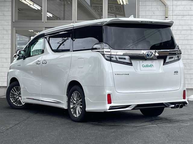 トヨタ ヴェルファイア ハイブリット ZR Gエディション 岩手県 2018(平30)年 4.8万km ホワイトパールクリスタルシャイン 4WD/フルエアロ（モデリスタ）/純正10インチナビ/前方ドライブレコーダー/純正フリップダウンモニター/トヨタセーフティーセンス/・レーントレーシングアシスト/・クリアランスソナー/・パーキングサポートブレーキ/・プリクラッシュセーフティー/・ロードサインアシスト/両側パワースライドドア/アダプティブクルーズコントロール/パワーバックドア/パワーシート/シートメモリー/全席シートヒーター/D/N席シートエアコン/ステアリングスイッチ/ステアリングヒーター/AC100V電源/デジタルインナーミラー/三眼LEDヘッドライト/LEDフォグランプ/オートライト/アダプティブハイビーム/LEDコーナリングランプ/LEDシーケンシャルターンランプ/AM/FM/CD/DVD/USB/HDMI/Bluetooth/ビルトインETC2.0/純正17インチアルミホイール/純正フロアマット/プッシュスタート/スマートキー/スペアキー/保証書/取扱説明書