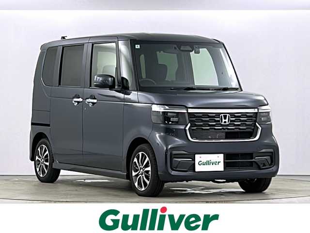 ホンダ Ｎ ＢＯＸ カスタム コーディネートスタイル 愛知県 2024(令6)年 0.2万km メテオロイドグレーメタリック 純正９インチナビ【フルセグ/Bluetooth/CD/DVD/AppleCarPlay　/バックカメラ　LXU-242NBi】/ビルトインＥＴＣ　/ドライブレコーダー　/片側パワースライドドア　/レーンキープアシスト　/衝突軽減ブレーキ/オートマチックハイビーム/オートライト/LEDライト/フォグランプ/前後コーナーセンサー/D席シートヒーター/レーダークルーズコントロール/スマートキー【スペア1本】/純正アルミホイール/純正フロアマット/禁煙車