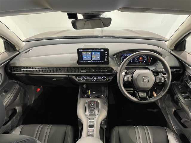 ホンダ ＺＲ－Ｖ ハイブリッド e:HEV Z 愛知県 2023(令5)年 1.5万km ワイン 純正９インチホンダコネクトディスプレー　/（AM/FM/Bluetooth/フルセグTV/CarPlay/USB)/マルチビューカメラ　/ホンダセンシング　/　　-衝突軽減ブレーキ（CMBS)/　　-誤発進抑制機能/　　-路外逸脱抑制機能/　　-渋滞追従機能付アダプティブクルーズコントロール（ACC）/　　-先行車発進お知らせ機能　/　　-標識認識機能/　　-オートハイビーム/　　-ブラインドスポットインフォメーション/　　-パーキングセンサーシステム/ビルトインＥＴＣ２．０　/LEDヘッドライト/シートヒーター/ステアリングヒーター　/電動バックドア　/ドライブレコーダー　/置くだけ充電　/電動パワーシート　/パドルシフト