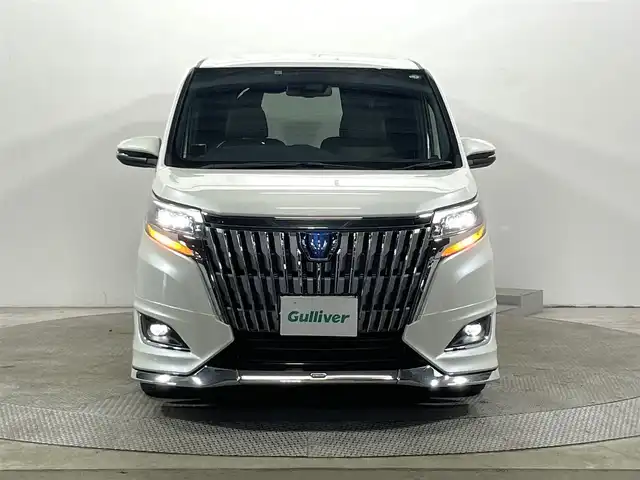 トヨタ エスクァイア ハイブリッド Gi プレミアムパッケージ 大阪府 2017(平29)年 5.4万km ホワイトパールクリスタルシャイン モデリスタエアロ 純正10incナビ(フルセグ/DVD再生/Bluetooth) バックカメラ 後席モニター ETC ハーフレザー シート＆ハンドルヒーター 衝突軽減 クルコン トヨタセーフティセンス