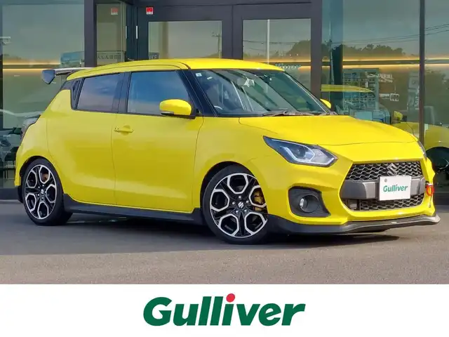 スズキ スイフト スポーツ セーフティPKG 東京都 2019(令1)年 4.6万km チャンピオンイエロー BLITZ車高調/GReddyエアロ/カーボンGTウイング/ロッソモデロマフラー/クスコ ストラットタワーバー/ヴァレンティLEDテールランプ/HKSエアクリーナー/社外ブースト計/Pivotサブコンピューター/デュアルセンサーブレーキサポート/車線逸脱警報機能/アダプティブクルーズコントロール/プッシュスタート/純正ナビ/フルセグTV/ETC/ドライブレコーダー/シートヒーター/LEDヘッドライト/17インチ純正アルミホイール/スマートキー