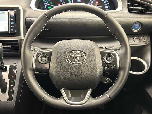 トヨタ シエンタ ハイブリッド ファンベースG セーフティEDⅡ 岐阜県 2022(令4)年 3.4万km ホワイトパールクリスタルシャイン 純正ナビゲーション(NS2T-W68T)/両側パワースライドドア/S-VSC/MODERISTAバックドアタープ/MODERISTAラゲージベンチシート/バックドアラック/ラゲージテーブル/バックカメラ/フルセグテレビ/Bluetooth/前後ドライブレコーダー/ETC2.0/クルーズコントロール/シートヒーター/ステアリングヒーター/コンセントAC100V1500W/プッシュスタート/スマートキー/LEDヘッドライト/オートライト/オートマチックハイビーム