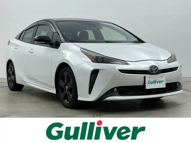 トヨタ プリウス S ツーリングセレ ブラックED 岡山県 2021(令3)年 3.8万km プラチナホワイトパールマイカ 純正８インチディスプレイオーディオ/ＡＣ１００Ｖ電源/ビルトインＥＴＣ/ドライブレコーダー（前/後）/バックカメラ/追従型クルーズコントロール/合皮シート/シートヒーター（運転席/助手席）/衝突軽減ブレーキ/コーナーセンサー（前/後）/LEDヘッドライト/オートライト/オートハイビーム/フォグランプ/禁煙車/純正17インチAW/スマートキー×1/新車保証書/スペアキー×１