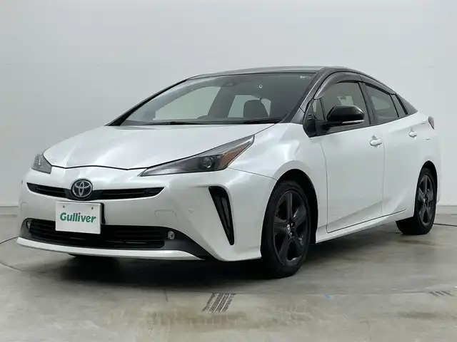 トヨタ プリウス S ツーリングセレ ブラックED 岡山県 2021(令3)年 3.8万km プラチナホワイトパールマイカ 純正８インチディスプレイオーディオ/ＡＣ１００Ｖ電源/ビルトインＥＴＣ/ドライブレコーダー（前/後）/バックカメラ/追従型クルーズコントロール/合皮シート/シートヒーター（運転席/助手席）/衝突軽減ブレーキ/コーナーセンサー（前/後）/LEDヘッドライト/オートライト/オートハイビーム/フォグランプ/禁煙車/純正17インチAW/スマートキー×1/新車保証書/スペアキー×１