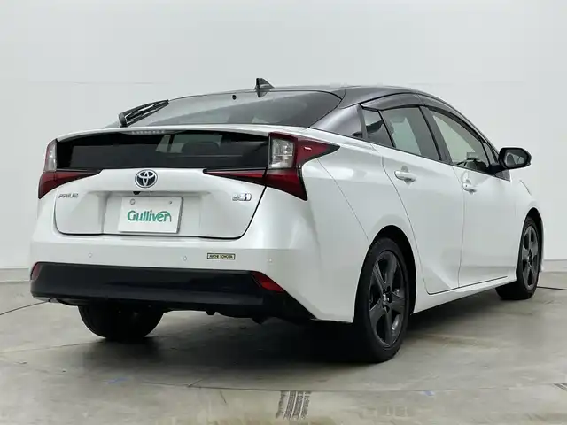 トヨタ プリウス S ツーリングセレ ブラックED 岡山県 2021(令3)年 3.8万km プラチナホワイトパールマイカ 純正８インチディスプレイオーディオ/ＡＣ１００Ｖ電源/ビルトインＥＴＣ/ドライブレコーダー（前/後）/バックカメラ/追従型クルーズコントロール/合皮シート/シートヒーター（運転席/助手席）/衝突軽減ブレーキ/コーナーセンサー（前/後）/LEDヘッドライト/オートライト/オートハイビーム/フォグランプ/禁煙車/純正17インチAW/スマートキー×1/新車保証書/スペアキー×１
