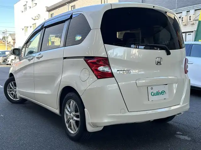 ホンダ フリード FLEX 愛知県 2011(平23)年 12.2万km プレミアムホワイトパール ワンオーナー/左リアパワースライドア/純正HDDナビ〈VXH-112VS〉/・DVD／ワンセグTV/バックカメラ/アンテナ分離型ETC/前方ドライブレコーダー〈FT-DR100S〉/社外レザー調シートカバー/社外15インチAW