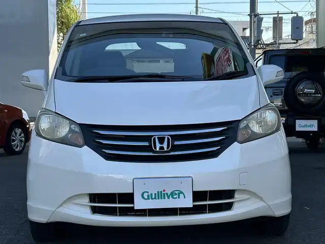 ホンダ フリード FLEX 愛知県 2011(平23)年 12.2万km プレミアムホワイトパール ワンオーナー/左リアパワースライドア/純正HDDナビ〈VXH-112VS〉/・DVD／ワンセグTV/バックカメラ/アンテナ分離型ETC/前方ドライブレコーダー〈FT-DR100S〉/社外レザー調シートカバー/社外15インチAW