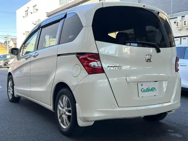 ホンダ フリード FLEX 愛知県 2011(平23)年 12.2万km プレミアムホワイトパール ワンオーナー/左リアパワースライドア/純正HDDナビ〈VXH-112VS〉/・DVD／ワンセグTV/バックカメラ/アンテナ分離型ETC/前方ドライブレコーダー〈FT-DR100S〉/社外レザー調シートカバー/社外15インチAW