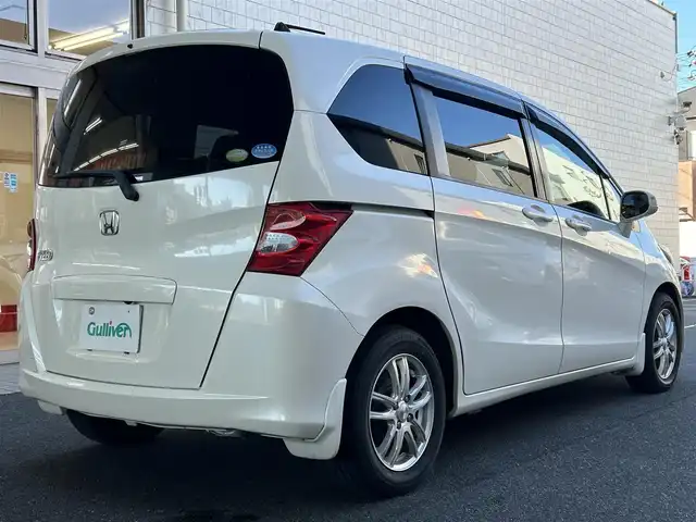 ホンダ フリード FLEX 愛知県 2011(平23)年 12.2万km プレミアムホワイトパール ワンオーナー/左リアパワースライドア/純正HDDナビ〈VXH-112VS〉/・DVD／ワンセグTV/バックカメラ/アンテナ分離型ETC/前方ドライブレコーダー〈FT-DR100S〉/社外レザー調シートカバー/社外15インチAW