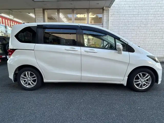 ホンダ フリード FLEX 愛知県 2011(平23)年 12.2万km プレミアムホワイトパール ワンオーナー/左リアパワースライドア/純正HDDナビ〈VXH-112VS〉/・DVD／ワンセグTV/バックカメラ/アンテナ分離型ETC/前方ドライブレコーダー〈FT-DR100S〉/社外レザー調シートカバー/社外15インチAW