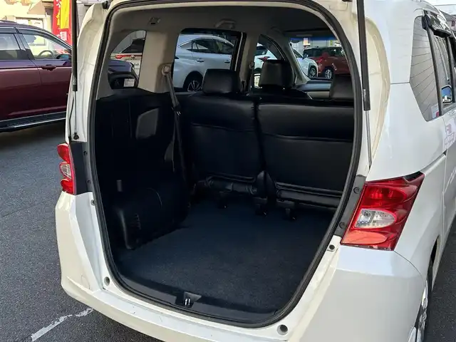 ホンダ フリード FLEX 愛知県 2011(平23)年 12.2万km プレミアムホワイトパール ワンオーナー/左リアパワースライドア/純正HDDナビ〈VXH-112VS〉/・DVD／ワンセグTV/バックカメラ/アンテナ分離型ETC/前方ドライブレコーダー〈FT-DR100S〉/社外レザー調シートカバー/社外15インチAW