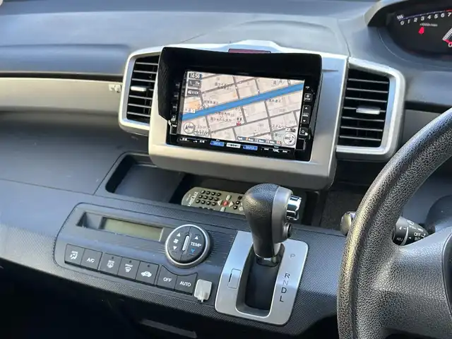 ホンダ フリード FLEX 愛知県 2011(平23)年 12.2万km プレミアムホワイトパール ワンオーナー/左リアパワースライドア/純正HDDナビ〈VXH-112VS〉/・DVD／ワンセグTV/バックカメラ/アンテナ分離型ETC/前方ドライブレコーダー〈FT-DR100S〉/社外レザー調シートカバー/社外15インチAW