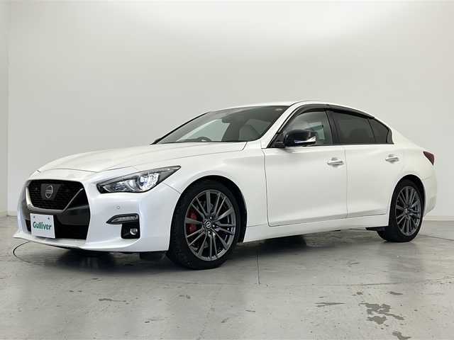 日産 スカイライン 400R 宮城県 2021(令3)年 7万km ブリリアントホワイトパール 禁煙車/BOSEサウンドスピーカー/エマージェンシーブレーキ/車線逸脱警報/アダプティブクルーズコントロール/ブラインドスポットモニター/セーフティシールド/アラウンドビューモニター/純正ナビ/・CD.DVD.SD.BT/フルセグTV/白本革シート/・前席パワーシート（D席シートメモリー）/・前席シートヒーター/ビルトインETC2.0/パドルシフト/ステアリングスイッチ/LEDヘッドライト/フォグランプ/プッシュスタート/スマートキー2個/レッドキャリパー/純正19インチアルミホイール/純正フロアマット