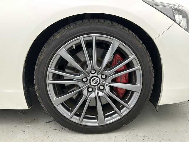 日産 スカイライン 400R 宮城県 2021(令3)年 7万km ブリリアントホワイトパール 禁煙車/BOSEサウンドスピーカー/エマージェンシーブレーキ/車線逸脱警報/アダプティブクルーズコントロール/ブラインドスポットモニター/セーフティシールド/アラウンドビューモニター/純正ナビ/・CD.DVD.SD.BT/フルセグTV/白本革シート/・前席パワーシート（D席シートメモリー）/・前席シートヒーター/ビルトインETC2.0/パドルシフト/ステアリングスイッチ/LEDヘッドライト/フォグランプ/プッシュスタート/スマートキー2個/レッドキャリパー/純正19インチアルミホイール/純正フロアマット