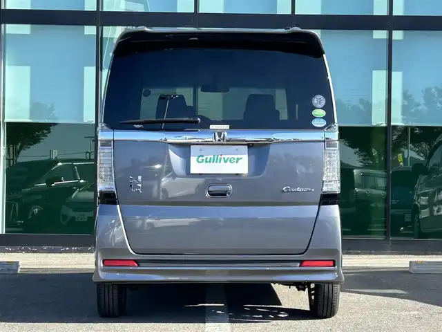 ホンダ Ｎ ＢＯＸ カスタム SSパッケージ 和歌山県 2017(平29)年 1.1万km シャイニンググレーM 純正ナビ/(AM/FM/CD/DVD/Bluetooth/TV)/バックカメラ/横滑り防止機能/シートヒーター/オートライト/両側パワースライドドア/ビルトインETC/ECON/ステアリングスイッチ/パワーウインドウ/プッシュスタート/スマートキー/電動格納ミラー/純正AW