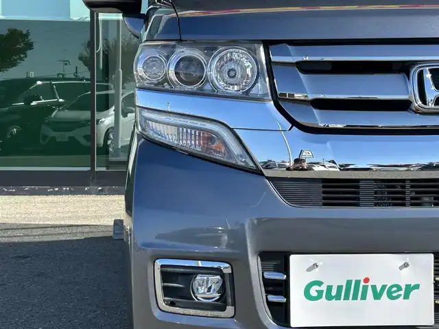 ホンダ Ｎ ＢＯＸ カスタム SSパッケージ 和歌山県 2017(平29)年 1.1万km シャイニンググレーM 純正ナビ/(AM/FM/CD/DVD/Bluetooth/TV)/バックカメラ/横滑り防止機能/シートヒーター/オートライト/両側パワースライドドア/ビルトインETC/ECON/ステアリングスイッチ/パワーウインドウ/プッシュスタート/スマートキー/電動格納ミラー/純正AW