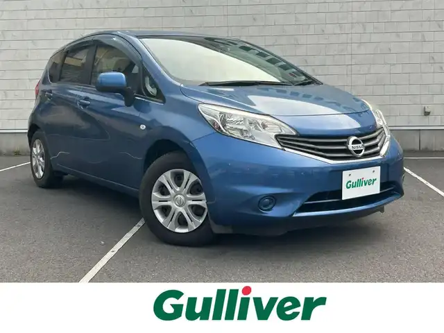 日産 ノート X エマージェンシーブレーキ 静岡県 2014(平26)年 3.9万km シャイニングブルー 純正ナビMM113D-W/（AM/FM/CD)/フルセグＴＶ/バックカメラ/ＥＴＣ/前方ドライブレコーダー/純正フロアマット/エマージェンシーブレーキ/レーンキープアシスト/横滑り防止装置/スマートキー/スペアキー×１/プッシュスタート/社外１４インチアルミホイールスタッドレスタイヤ付き積み込み/電格ミラー/アイドリングストップ