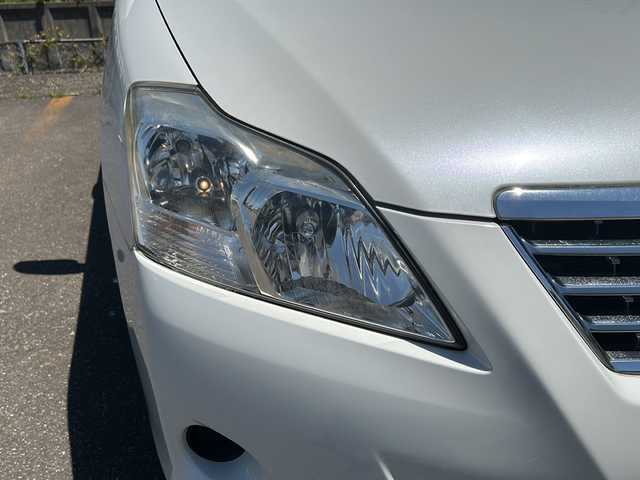 トヨタ プレミオ 1．5F Lパッケージ 新潟県 2010(平22)年 6.3万km ホワイトパールクリスタルシャイン ４WD/スペアタイヤ/ジャッキ/ETC/ワンセグテレビ/プッシュスタート/アンチロックブレーキシステム/DVD再生機能/フロアマット純正