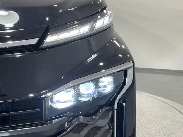 トヨタ ヴォクシー ハイブリッド S－Z 愛知県 2022(令4)年 1.8万km アティチュードブラックマイカ 純正10.5インチディスプレイオーディオ＋/（Bluetooth/フルセグTV/Carplay/AM/FM）/フリップダウンモニター/クルーズコントロール/AC100V/ビルトインETC2.0/シートヒーター/LEDオートライト/オートマチックハイビーム/（プロジェクター式LEDヘッドライト）/衝突軽減ブレーキ/バックカメラ/両側電動スライドドア/デジタルインナーミラー/コーナーセンサー/純正17インチAW