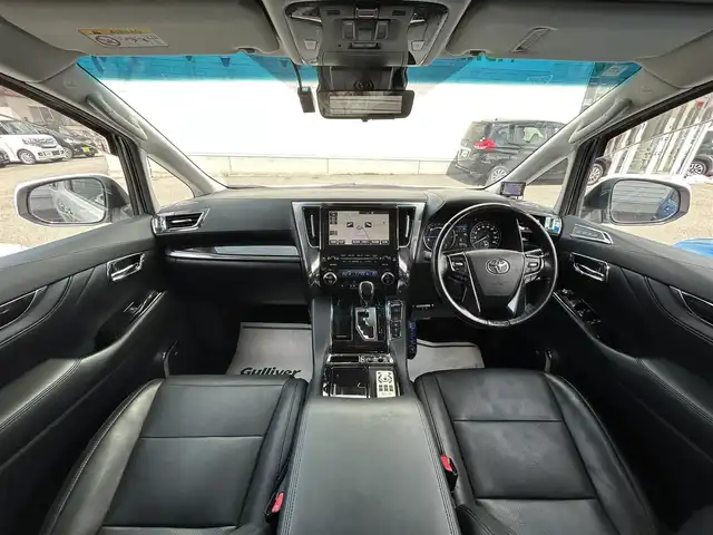 トヨタ アルファードハイブリット SR Cパッケージ 山形県 2019(令1)年 8.2万km ホワイトパールクリスタルシャイン 4WD/純正9インチナビ/ＪＢＬサウンド/純正フリップダウンモニター/全周囲カメラ/ＴＲＤフルエアロ/TRDマフラー/TEIN車高調/トヨタセーフティセンス/レーダークルーズコントロール/デジタルインナーミラー/純正ドライブレコーダー/ビルトインＥＴＣ/黒革シート/シートヒーター&ハンドルヒーター/禁煙車
