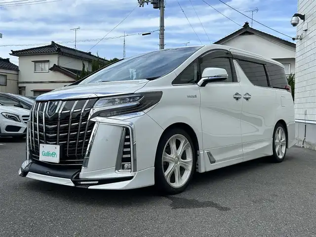 トヨタ アルファードハイブリット SR Cパッケージ 山形県 2019(令1)年 8.2万km ホワイトパールクリスタルシャイン 4WD/純正9インチナビ/ＪＢＬサウンド/純正フリップダウンモニター/全周囲カメラ/ＴＲＤフルエアロ/TRDマフラー/TEIN車高調/トヨタセーフティセンス/レーダークルーズコントロール/デジタルインナーミラー/純正ドライブレコーダー/ビルトインＥＴＣ/黒革シート/シートヒーター&ハンドルヒーター/禁煙車