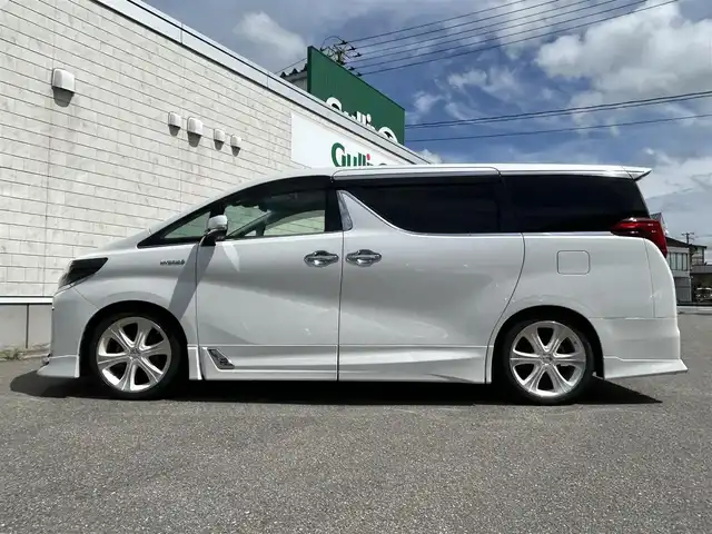 トヨタ アルファードハイブリット SR Cパッケージ 山形県 2019(令1)年 8.2万km ホワイトパールクリスタルシャイン 4WD/純正9インチナビ/ＪＢＬサウンド/純正フリップダウンモニター/全周囲カメラ/ＴＲＤフルエアロ/TRDマフラー/TEIN車高調/トヨタセーフティセンス/レーダークルーズコントロール/デジタルインナーミラー/純正ドライブレコーダー/ビルトインＥＴＣ/黒革シート/シートヒーター&ハンドルヒーター/禁煙車