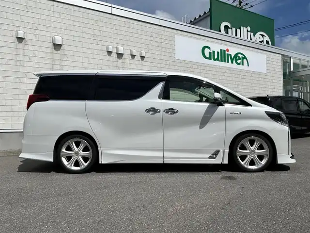 トヨタ アルファードハイブリット SR Cパッケージ 山形県 2019(令1)年 8.2万km ホワイトパールクリスタルシャイン 4WD/純正9インチナビ/ＪＢＬサウンド/純正フリップダウンモニター/全周囲カメラ/ＴＲＤフルエアロ/TRDマフラー/TEIN車高調/トヨタセーフティセンス/レーダークルーズコントロール/デジタルインナーミラー/純正ドライブレコーダー/ビルトインＥＴＣ/黒革シート/シートヒーター&ハンドルヒーター/禁煙車