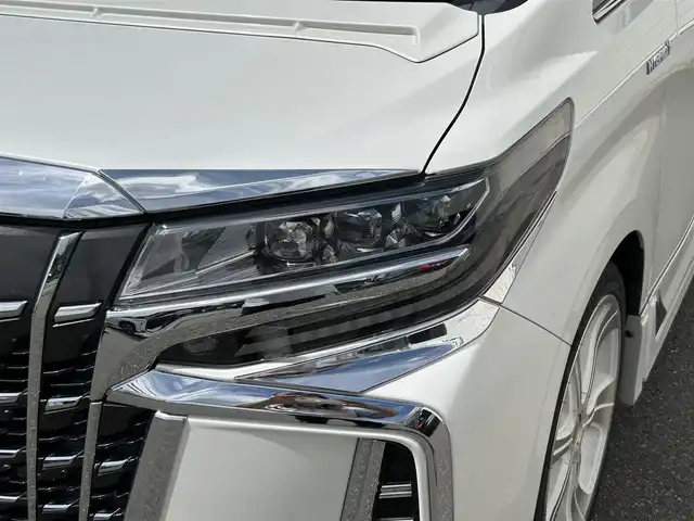 トヨタ アルファードハイブリット SR Cパッケージ 山形県 2019(令1)年 8.2万km ホワイトパールクリスタルシャイン 4WD/純正9インチナビ/ＪＢＬサウンド/純正フリップダウンモニター/全周囲カメラ/ＴＲＤフルエアロ/TRDマフラー/TEIN車高調/トヨタセーフティセンス/レーダークルーズコントロール/デジタルインナーミラー/純正ドライブレコーダー/ビルトインＥＴＣ/黒革シート/シートヒーター&ハンドルヒーター/禁煙車