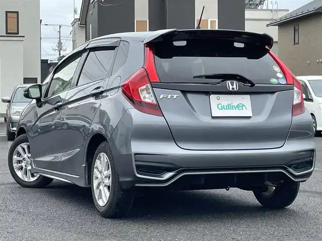ホンダ フィット 13G S ホンダセンシング 道央・札幌 2017(平29)年 4.9万km シャイニンググレーM ワンオーナー/社外メモリナビ/AM/FM/BT/SD/DVD/フルセグ/ホンダセンシング/衝突被害軽減ブレーキ/横滑り防止装置/アダプティブクルーズコントロール/レーンキープアシスト/バックカメラ/ビルトインETC/アイドリングストップ/ECON/ステアリングリモコン/パドルシフト/MTモード付AT/プッシュスタート/スマートキー/LEDヘッドライト/オートライト/フォグランプ/電動格納ミラー/ウィンカーミラー/純正フロアマット/ドアバイザー/スペアキー/純正エンジンスターター/社外AW付冬タイヤ積込/175/70/R14/2024年/山7mm