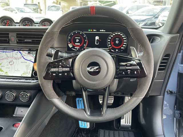 日産 フェアレディ Ｚ ニスモ 兵庫県 2024(令6)年 0.2万km グレーⅡ 登録時走行距離1923km/ワンオーナー/カラー番号【XLV】/NISMOステルスグレー/スーパーブラック2トーン/純正9インチワイドディスプレイ日産コネクトナビ/フルセグTV/Bluetooth/AppleCarPlay/BOSEサウンド/バックカメラ/先進運転支援技術/インテリジェントクルーズ/前方衝突予測警報/インテリジェントエマージェンシーブレーキ/踏み間違い防止アシスト/車線逸脱警報/後側方車両検知警報/後退時車両検知警報/LEDヘッドランプ/nismoロゴ入台形ブラックハニカムメッシュフロントエアロバンパー/レッドライン入ブラックフロントスポイラー/RAYS製9本スポークブラック塗装鍛造19インチアルミホイール/専用サスペンション/レッドブレーキキャリパー/メカニカルLSD/ブラック/レッドツートンRECARO製革/アルカンターラコンビスポーツシート/インテリジェントキー/プッシュエンジンスターター/ETC2.0/保証書/取説/スペアキー1本