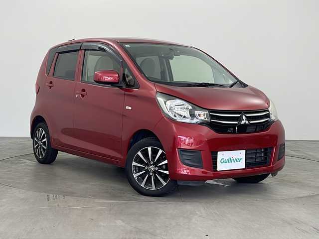 三菱 ｅＫワゴン E 兵庫県 2017(平29)年 4.5万km レッドメタリック ・社外ナビ/・Bluetooth/CD/SD/ワンセグテレビ/・4WD/・運転席シートヒーター/・ETC/・前方ドライブレコーダー/・ヘッドライトレベライザー/・社外14インチアルミホイール/・Wエアバッグ/・フロアマット/・ドアバイザー