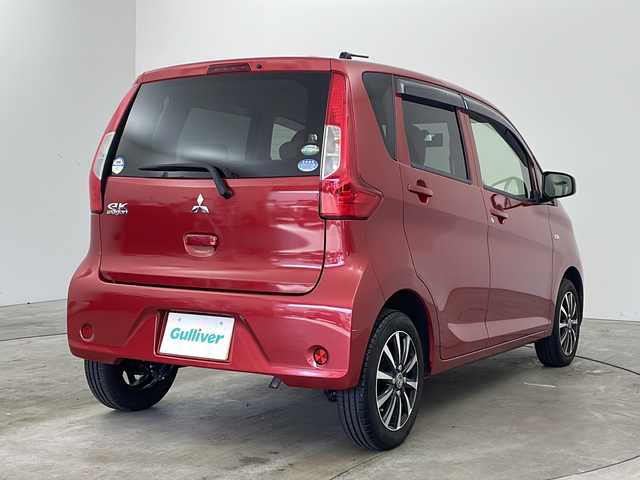 三菱 ｅＫワゴン E 兵庫県 2017(平29)年 4.5万km レッドメタリック ・社外ナビ/・Bluetooth/CD/SD/ワンセグテレビ/・4WD/・運転席シートヒーター/・ETC/・前方ドライブレコーダー/・ヘッドライトレベライザー/・社外14インチアルミホイール/・Wエアバッグ/・フロアマット/・ドアバイザー