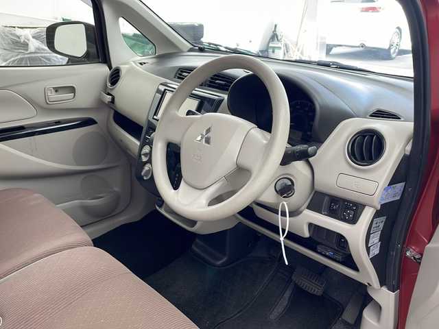 三菱 ｅＫワゴン E 兵庫県 2017(平29)年 4.5万km レッドメタリック ・社外ナビ/・Bluetooth/CD/SD/ワンセグテレビ/・4WD/・運転席シートヒーター/・ETC/・前方ドライブレコーダー/・ヘッドライトレベライザー/・社外14インチアルミホイール/・Wエアバッグ/・フロアマット/・ドアバイザー