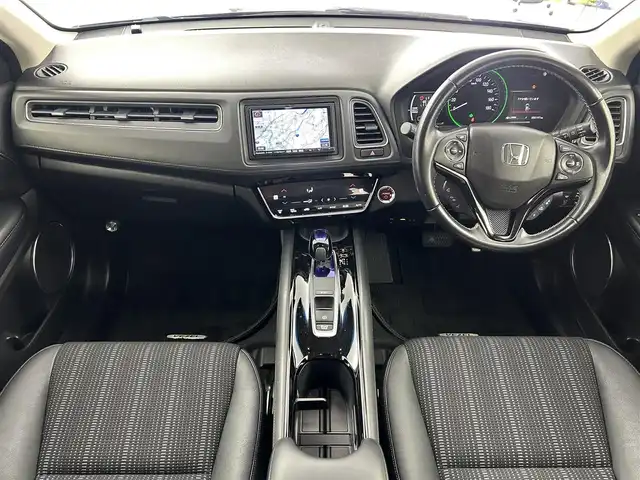 ホンダ ヴェゼル ハイブリッド Z ホンダセンシング 大阪府 2016(平28)年 5.9万km モルフォブルーP ホンダセンシング/　・衝突被害軽減システム/　・レーンキープアシスト/　・前後パーキングセンサーシステム/　・電動パーキングブレーキ/　・オートブレーキホールド/　・アダプティブクルーズコントロール/社外メモリナビ/　　CD/DVD/BT/USB/フルセグTV/バックカメラ/LEDオートライト/フォグランプ/合皮ハーフレザーシート/シートヒーター/純正17インチアルミホイール/パドルシフト/スマートキー/ETC