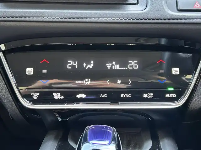 ホンダ ヴェゼル ハイブリッド Z ホンダセンシング 大阪府 2016(平28)年 5.9万km モルフォブルーP ホンダセンシング/　・衝突被害軽減システム/　・レーンキープアシスト/　・前後パーキングセンサーシステム/　・電動パーキングブレーキ/　・オートブレーキホールド/　・アダプティブクルーズコントロール/社外メモリナビ/　　CD/DVD/BT/USB/フルセグTV/バックカメラ/LEDオートライト/フォグランプ/合皮ハーフレザーシート/シートヒーター/純正17インチアルミホイール/パドルシフト/スマートキー/ETC