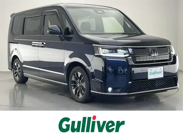 ホンダ ステップワゴン スパーダ eHEV 愛知県 2022(令4)年 3.4万km ミッドナイトブルービームM 純正９型ＤＡ　全方位カメラ　ＢＳＭ　追従クルコン　黒ハーフレザー　両側パワスラ　パドルシフト　フルセグ　ＤＶＤ　シートヒーター　衝突軽減　ETC　コーナーセンサー　LED　オートハイビーム　禁煙車　車線逸脱　スマートキー　プッシュスタート