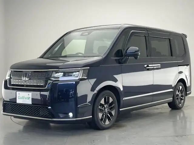ホンダ ステップワゴン スパーダ eHEV 愛知県 2022(令4)年 3.4万km ミッドナイトブルービームM 純正９型ＤＡ　全方位カメラ　ＢＳＭ　追従クルコン　黒ハーフレザー　両側パワスラ　パドルシフト　フルセグ　ＤＶＤ　シートヒーター　衝突軽減　ETC　コーナーセンサー　LED　オートハイビーム　禁煙車　車線逸脱　スマートキー　プッシュスタート