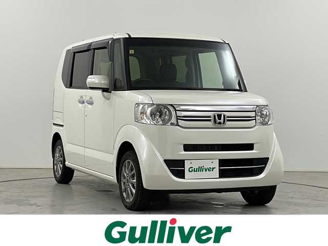 ホンダ Ｎ ＢＯＸ G SSパッケージ 道央・札幌 2017(平29)年 2.4万km プレミアムホワイトパールⅡ ・４WD  /・社外ナビ　CN-RE03D/・DVD.CD.フルセグ/・Bluetooth/バックカメラ/・両側パワースライドドア/・社外シートカバー/・シートヒーター/ミラーヒーター/・ビルトインETC/・プッシュスタート/スマートキー/・横滑り防止装置/・HIDライト /オートライト