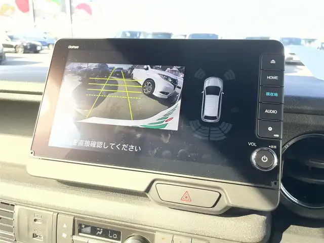 ホンダ Ｎ ＢＯＸ カスタム 滋賀県 2024(令6)年 0.2万km メテオロイドグレーメタリック 禁煙車/純正9インチナビ/(CD/DVD/フルセグ/Bluetooth)/バックカメラ/コーナーセンサー/ETC/片側電動/レーダークルコン/シートヒーター(D/N)/前方ドラレコ/ステアリングスイッチ/LEDヘッドライト/オートライト/スマートキー/プッシュスタート/スペアキー