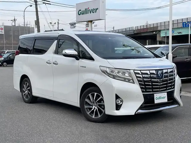 トヨタ アルファードハイブリット G 石川県 2016(平28)年 4.7万km ホワイトパールクリスタルシャイン 4WD/純正10型ナビ/フルセグTV/バックカメラ/LEDヘッドライト/ETC/ダブルサンルーフ/純正アルミホイール/フリップダウンモニター/シートカバー/ドライブレコーダー/レーダーブレーキ/クルーズコントロール/両側パワースライドドア/スマートキー/プッシュスタート/電動ミラー/保証書