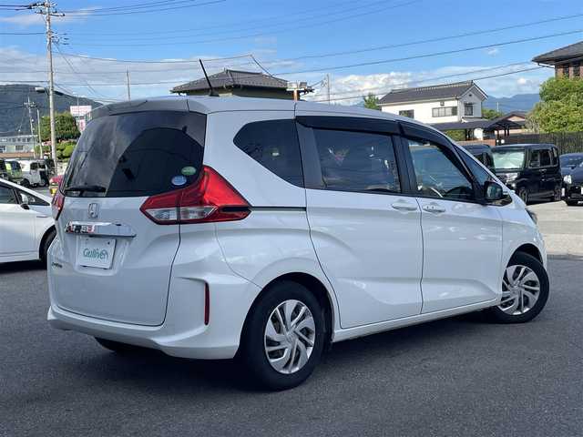 ホンダ フリード G ホンダセンシング 山梨県 2017(平29)年 10万km ホワイトオーキッドパール 純正メモリナビ(VXM-174VFi)/純正CD/DVD/Bluetooth接続/フルセグTV/バックカメラ/ETC/ドライブレコーダー/両側電動スライドドア/アダプティブクルーズコントロール/ステアリングスイッチ/取扱説明書/保証書