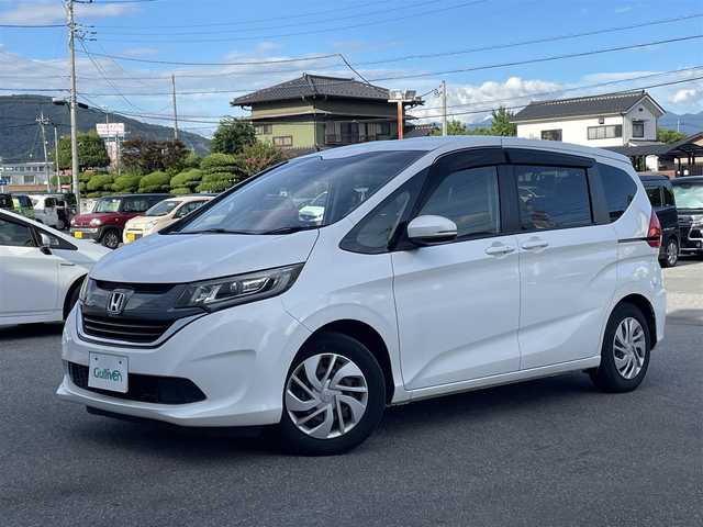 ホンダ フリード G ホンダセンシング 山梨県 2017(平29)年 10万km ホワイトオーキッドパール 純正メモリナビ(VXM-174VFi)/純正CD/DVD/Bluetooth接続/フルセグTV/バックカメラ/ETC/ドライブレコーダー/両側電動スライドドア/アダプティブクルーズコントロール/ステアリングスイッチ/取扱説明書/保証書