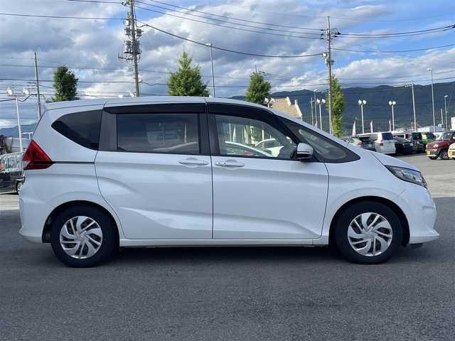 ホンダ フリード G ホンダセンシング 山梨県 2017(平29)年 10万km ホワイトオーキッドパール 純正メモリナビ(VXM-174VFi)/純正CD/DVD/Bluetooth接続/フルセグTV/バックカメラ/ETC/ドライブレコーダー/両側電動スライドドア/アダプティブクルーズコントロール/ステアリングスイッチ/取扱説明書/保証書